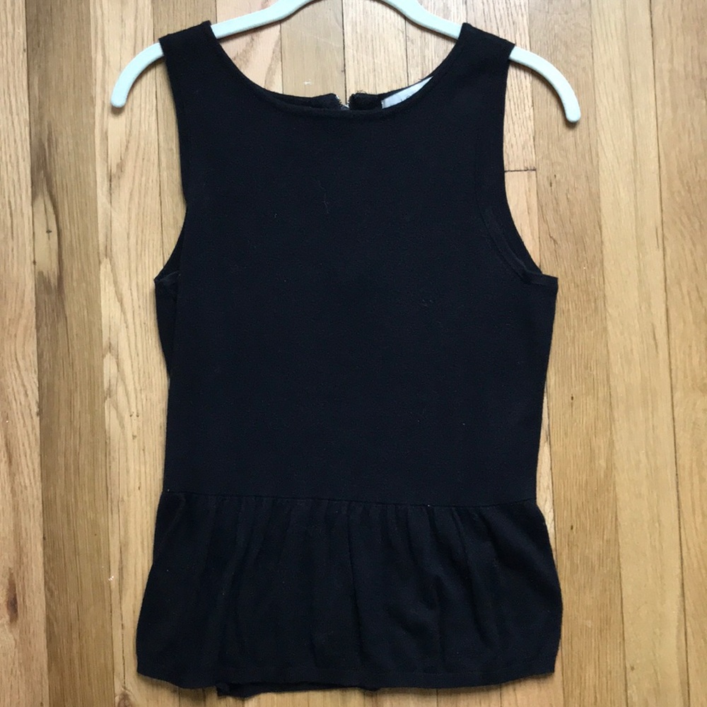 Black knit tank with subtle peplum
